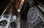 The rose window is pictured during preliminary work in the Notre-Dame de Paris Cathedral three months after a major fire Wednesday, July 17, 2019 in P