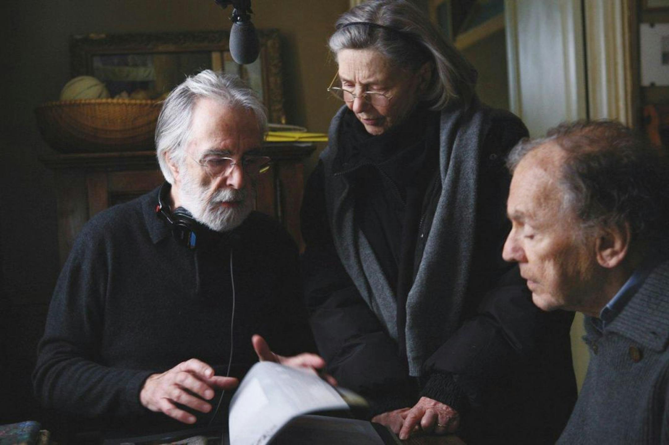 Director Michael Haneke, left, with stars Emmanuelle Riva and Jean-Louis Trintignant on the set of "Amour." Photo by � Denis Manin, Courtesy of Sony Pictures Classics