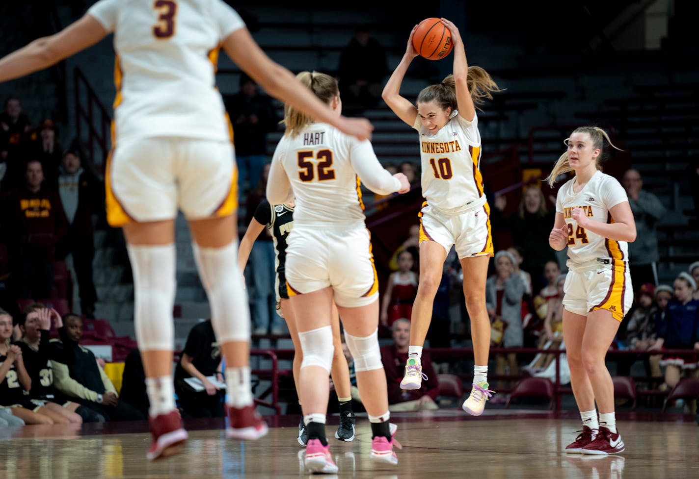 Minnesota guard Mara Braun (10) throws the ball to the ground as the team celebrates their win after Minnesota guard Amaya Battle (3) made two free throws, putting the final score at 60-58 with three seconds to go in the Williams Arena on Sunday, Dec. 10, 2023 in Minneapolis, Minn. ] Angelina Katsanis • angelina.katsanis@startribune.com