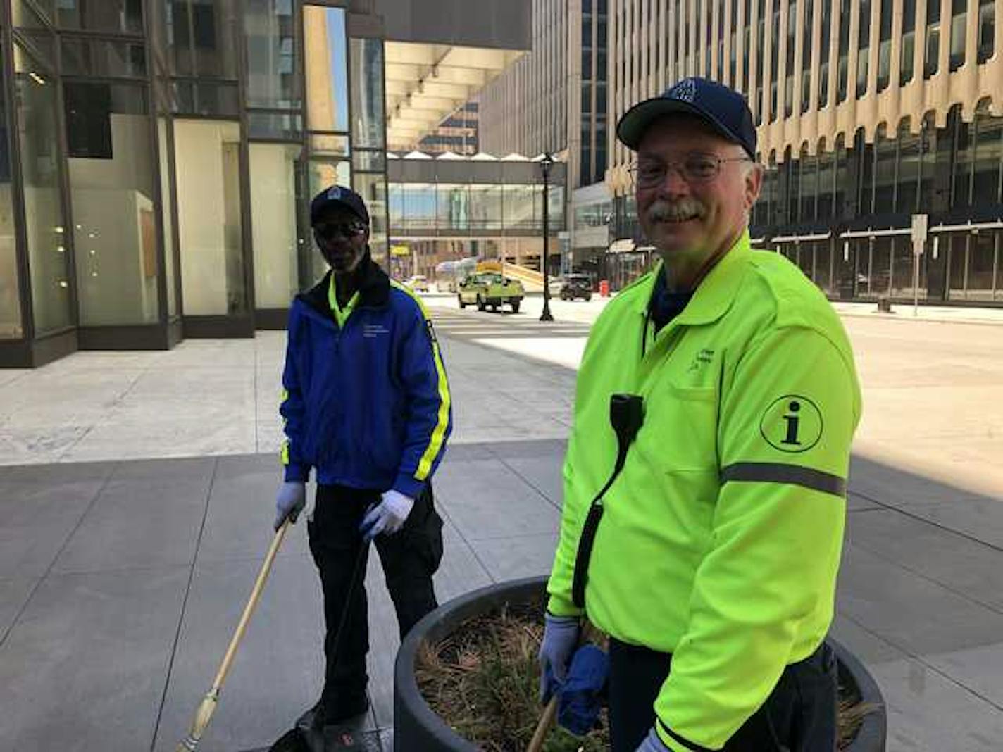 Downtown Improvement Zone "ambassadors" Frank Holmes (left) and Dave Hallenberger on Nicollet Mall.