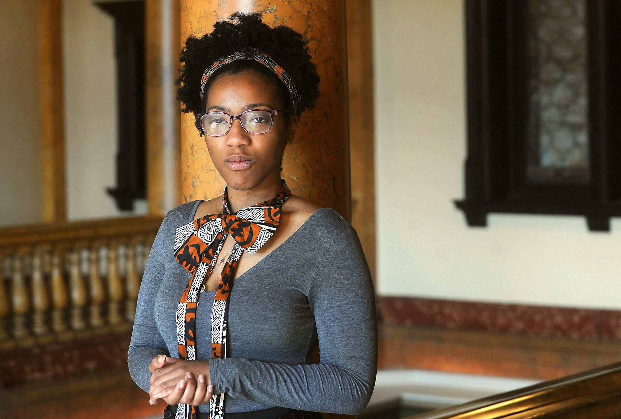 Ciera Young, 24, a native of Columbus, Ohio and now living in Homewood, stands inside the Grand Concourse at Station Square. She is a graduate of Chatham University and is currently working as a Coro Fellow at the South Side-based Women and Girls Foundation earning a $1,300 monthly stipend. She is worried about how the rising cost of living will affect her if she is unable to find a job or earn enough to sustain a middle-class lifestyle. (Nate Guidry/Pittsburgh Post-Gazette/TNS) ORG XMIT: 118362
