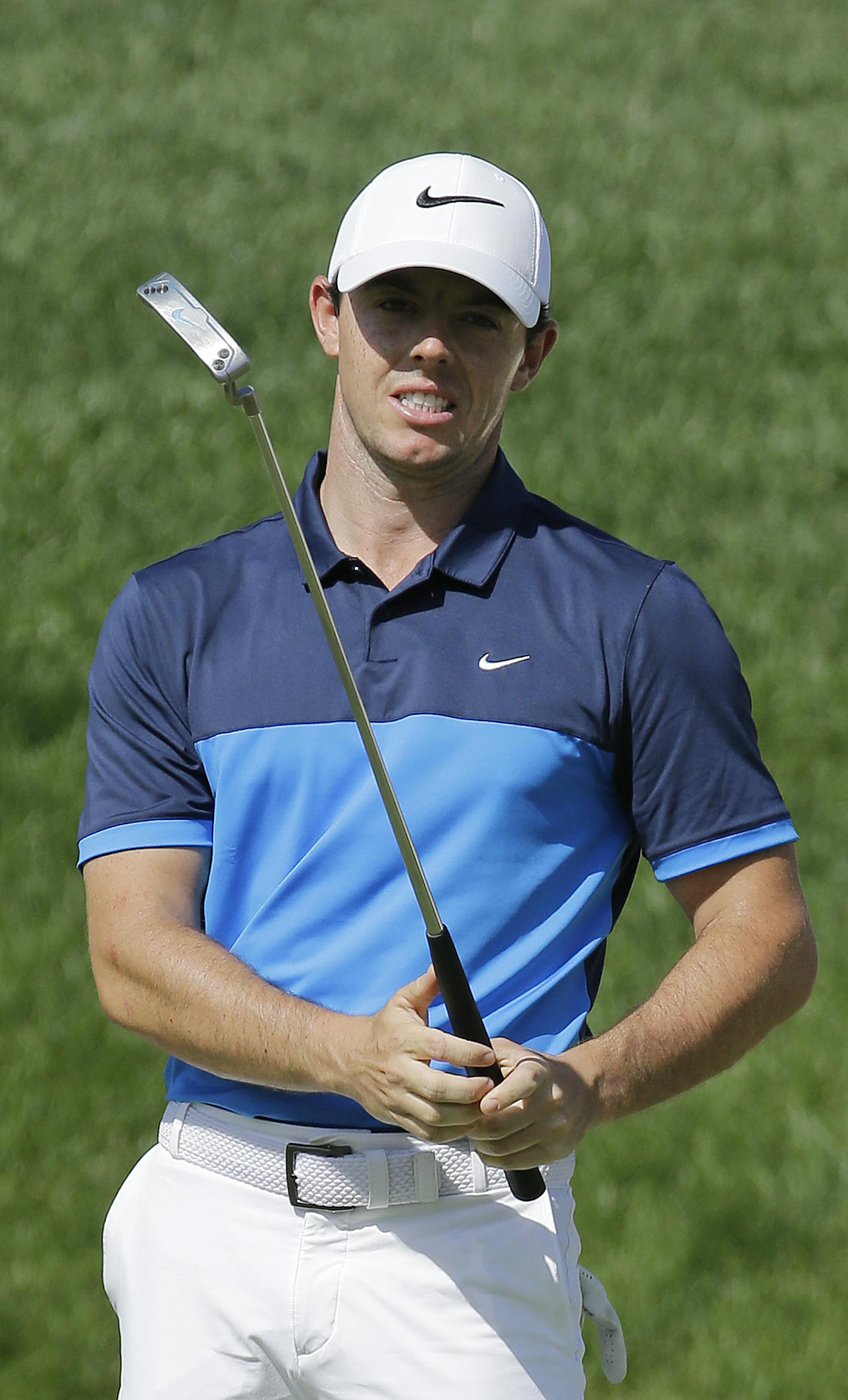 Rory McIlroy, of Northern Ireland, reacts to a missed putt on the 14th green during the second round of the Memorial golf tournament, Friday, June 3, 2016, in Dublin, Ohio. (AP Photo/Darron Cummings) ORG XMIT: OHDC148