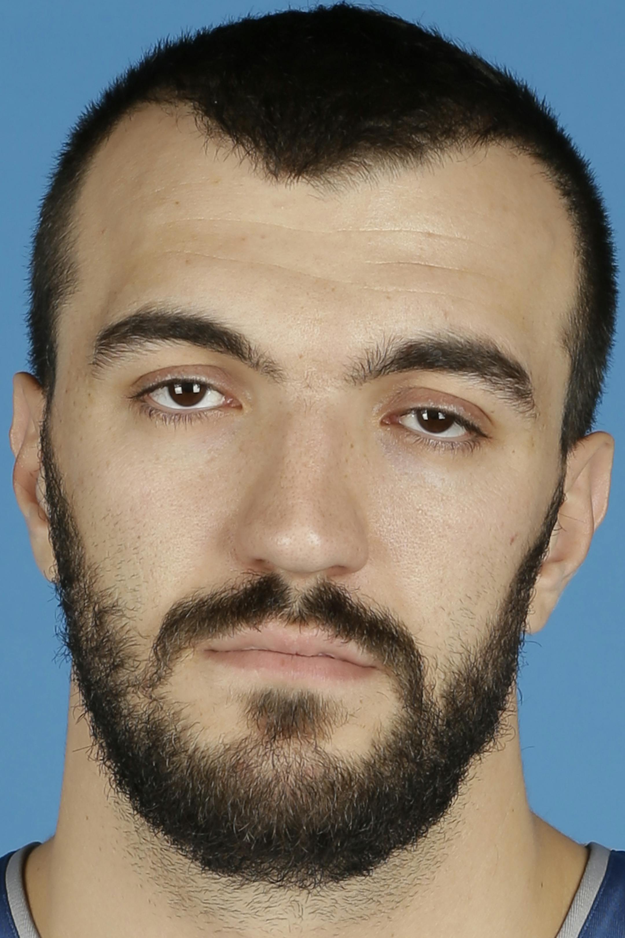 Minnesota Timberwolves' Nikola Pekovic of Montenegro poses for the NBA basketball team's media day, Monday, Sept. 30, 2013, in Minneapolis. (AP Photo/Jim Mone) ORG XMIT: NYOTK