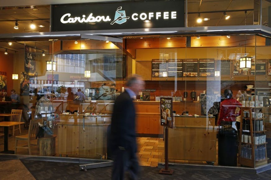 At the Caribou Coffee shop in the U.S. Bank building in downtown Minneapolis, customers in Minnesota will continue to see the Caribou Coffee brand while 88 stores East will be converted to Peet's Coffee & Tea .
