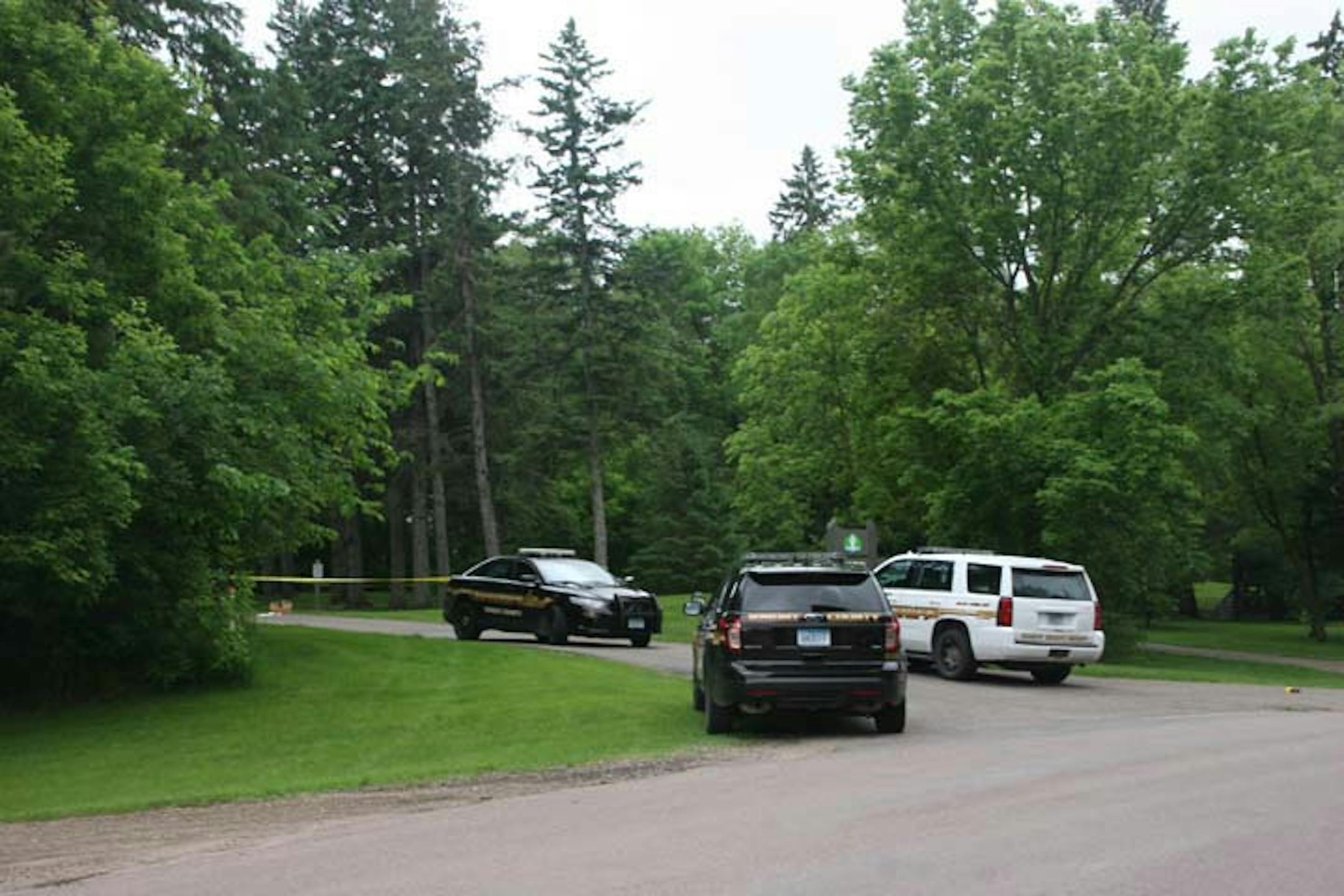 Crow Springs County Park is closed, with caution tape and Wright County Sheriff's Office vehicles blocking the entrance, as officers investigate the circumstances surrounding a critically injured woman found there early Wednesday.