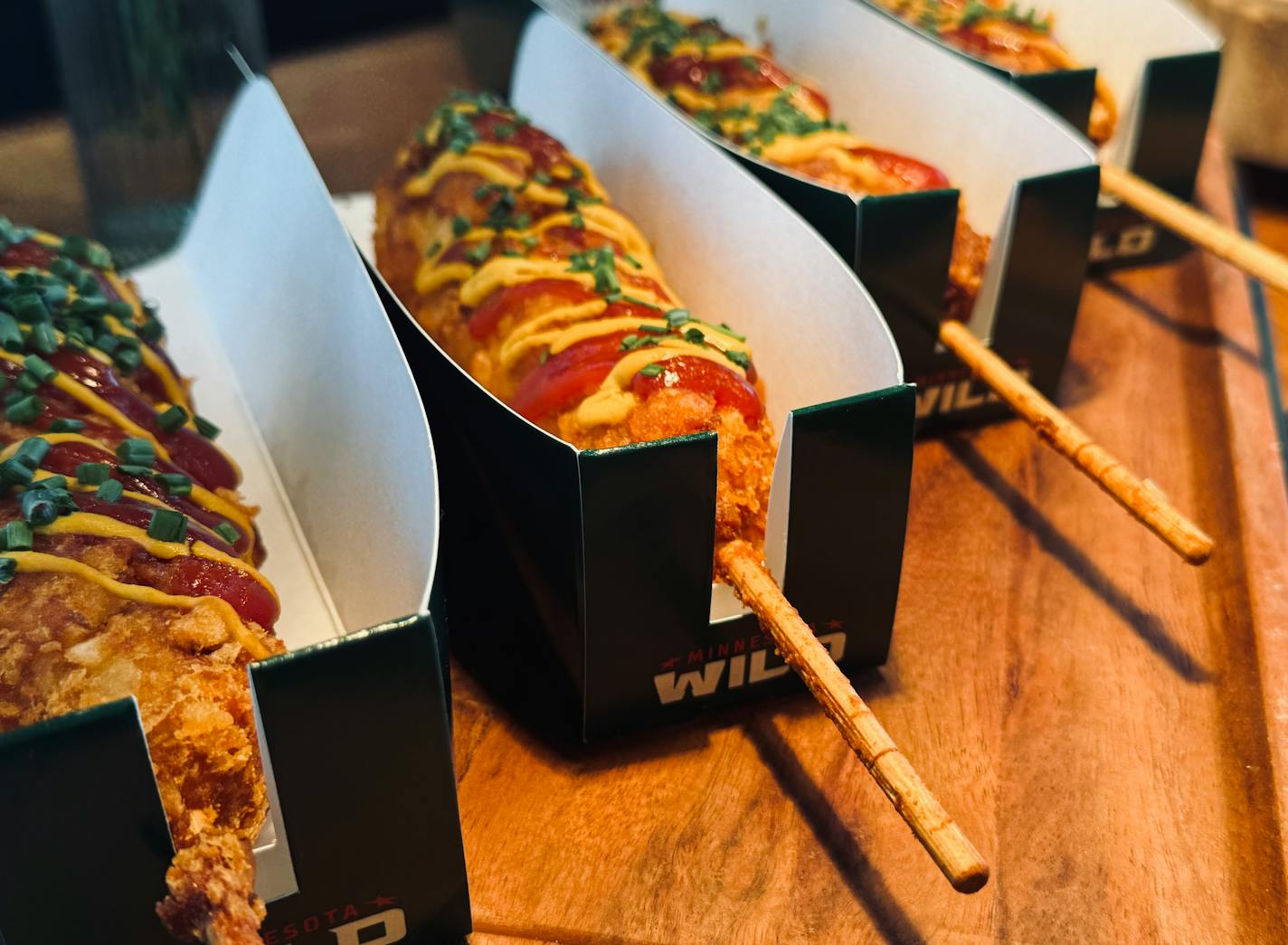 Ahead of the Minnesota Wild home opener, Xcel Energy Center unveiled 30 new foods including a potato chip coated corn dog, dill pickle pizza and mint chocolate cookie dough that will be available during home games.