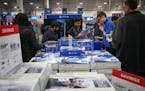 Shoppers looked for deals on PS4 and Xbox at the Best Buy Richfield Best Buy store on Thanksgiving. The holiday electronics sales boom is expected to 