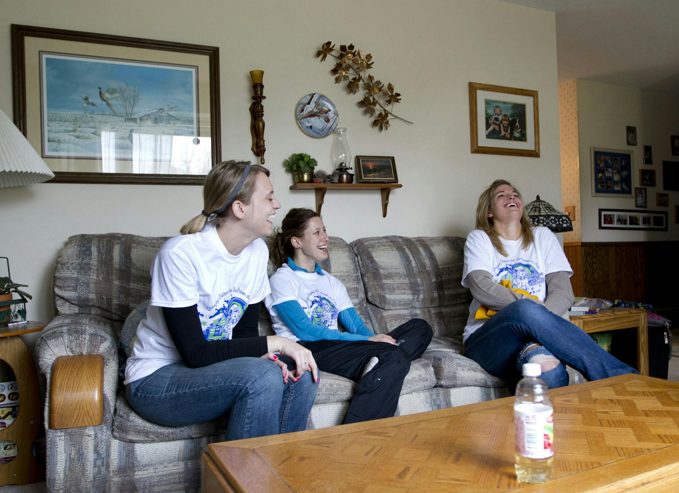 Special Spaces volunteers Caitlin Michels, Laura Purcell and Alex Moen waited for Kasey to see her brand new bedroom in the Reamer's family home in Prior Lake on Saturday afternoon. Non-profit organization Special Spaces works to create dream bedrooms for children with life-threatening diseases. ] NICOLA LOSIK* nicola.losik@startribune.com