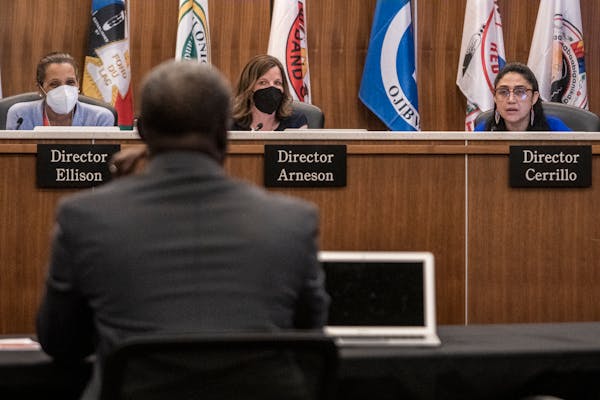 Senior Finance Officer Ibrahima Diop addressed the budget shortfall in front of Minneapolis school board members Kim Ellison, Jenny Arneson and Adrian