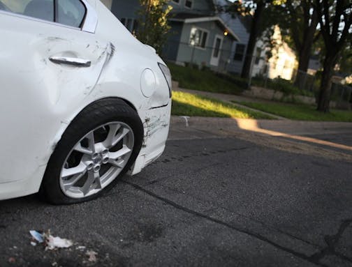 A man died Wednesday night after he was shot in a car that sped off, crashed into a parked vehicle and landed on its roof, Minneapolis police said.