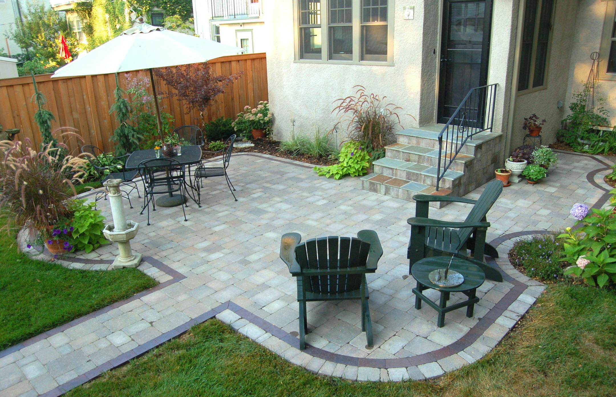 BEFORE and AFTER - AFTER of a Mpls. backyard landscaped by Bachman's. provided by bachman's.