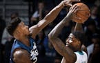 Wolves guard Jimmy Butler defended against the Hornets' Dwayne Bacon in the first quarter at Target Center on Sunday night. Butler is one of several v