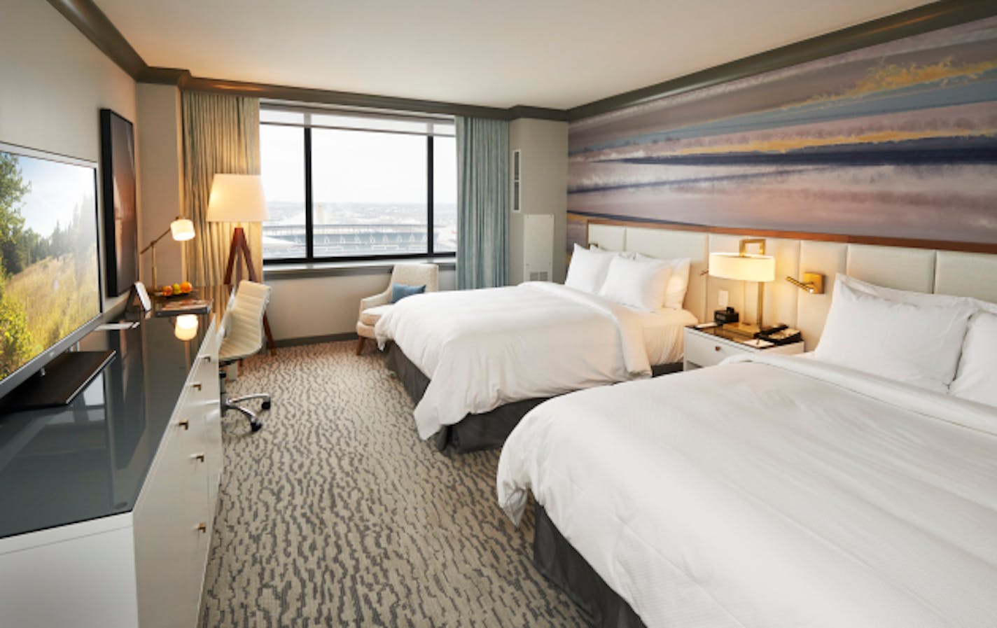 A double-queen room at the newly renovated Loews Hotel downtown Minneapolis.