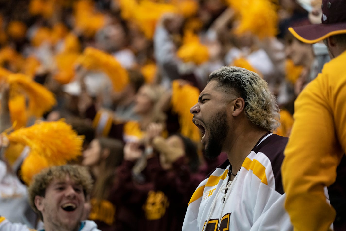 Gopher fan Andrew Mercado celebrates the Gopher's first point in the first period. The Minnesota Gophers men's hockey hosted the Minnesota State Mavericks on Friday, Oct. 7, 2022 at Mariucci Arena in Minneapolis, Minn. ] RENEE JONES SCHNEIDER • renee.jones@startribune.com