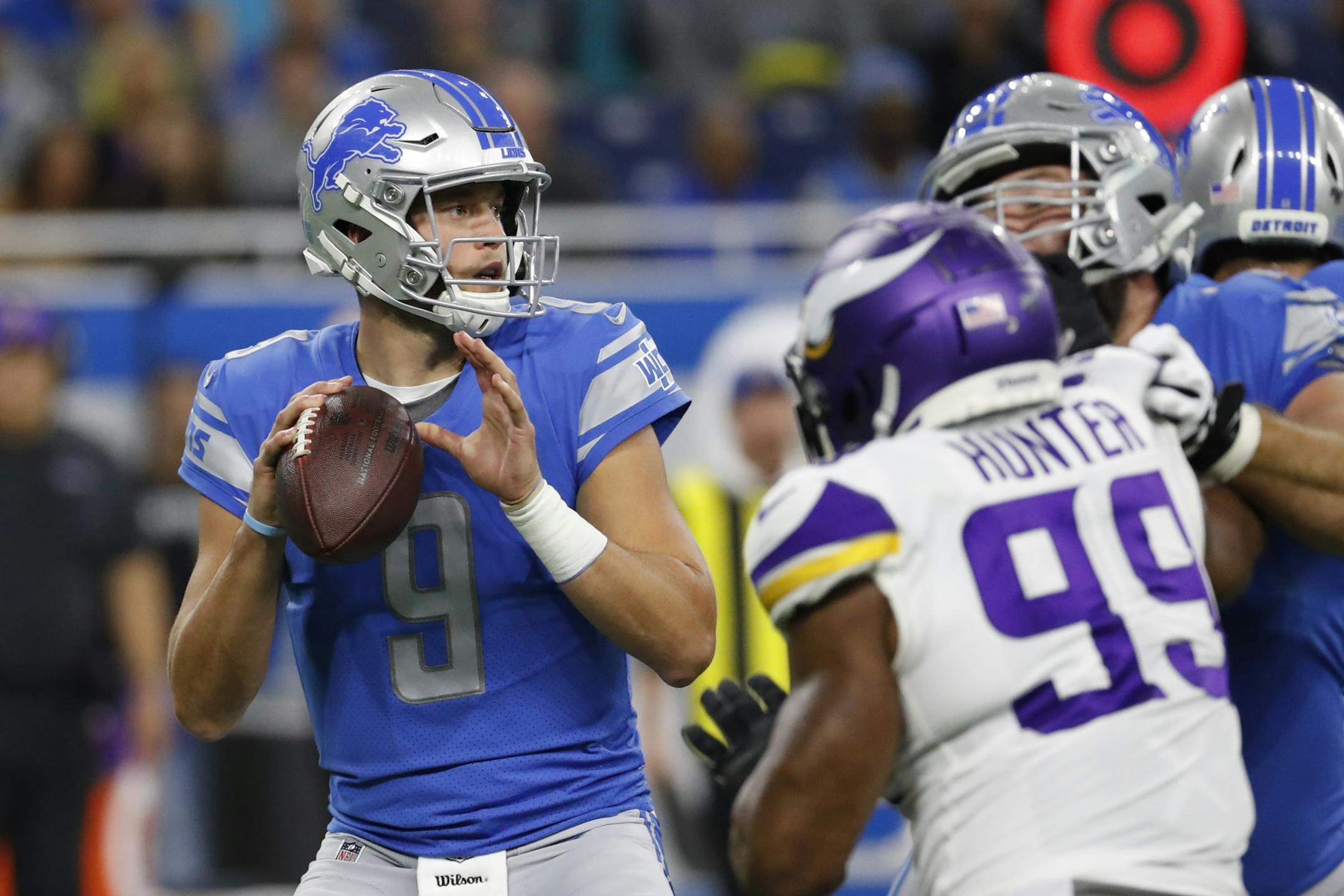 Detroit Lions quarterback Matthew Stafford looks to pass during the first half of an NFL football game against the Minnesota Vikings, Sunday, Oct. 20, 2019, in Detroit.