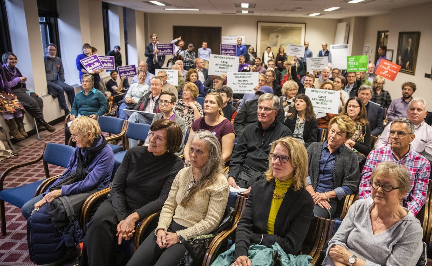 The city needed two overflow rooms to accommodate residents who wanted to attend the meeting about the 2040 plan.