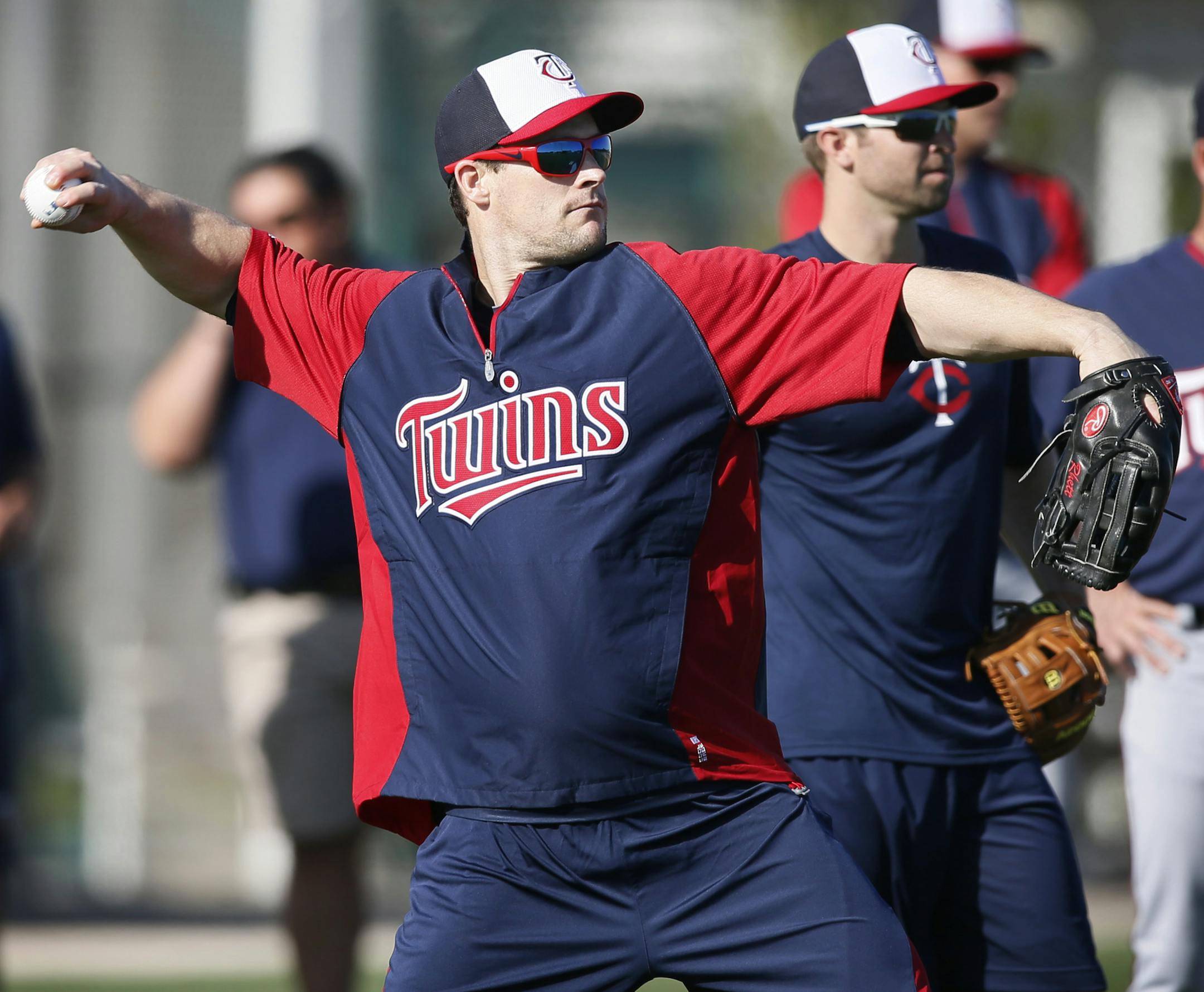 Twins outfielder Josh Willingham warmed up on his first day of spring training Wednesday Feb 19. 2014 Fort Myers, Florida at Lee County Sports Complex.. ] JERRY HOLT jerry.holt@startribune.com