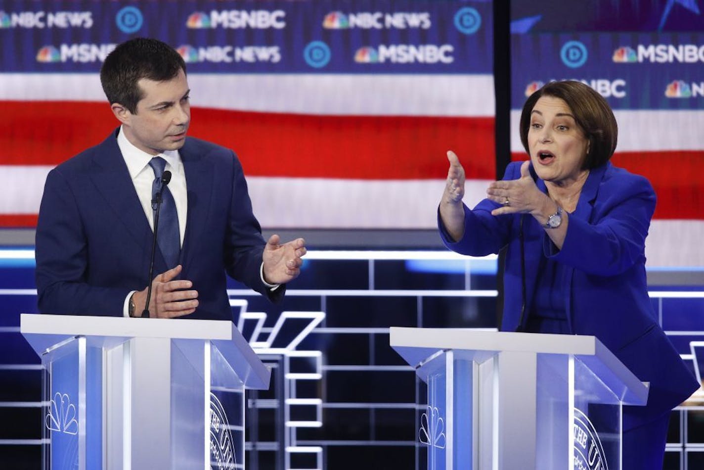 Democratic presidential candidates, Sen. Amy Klobuchar, D-Minn., right, speaks as former South Bend Mayor Pete Buttigieg looks on during a Democratic presidential primary debate Wednesday, Feb. 19, 2020, in Las Vegas, hosted by NBC News and MSNBC.