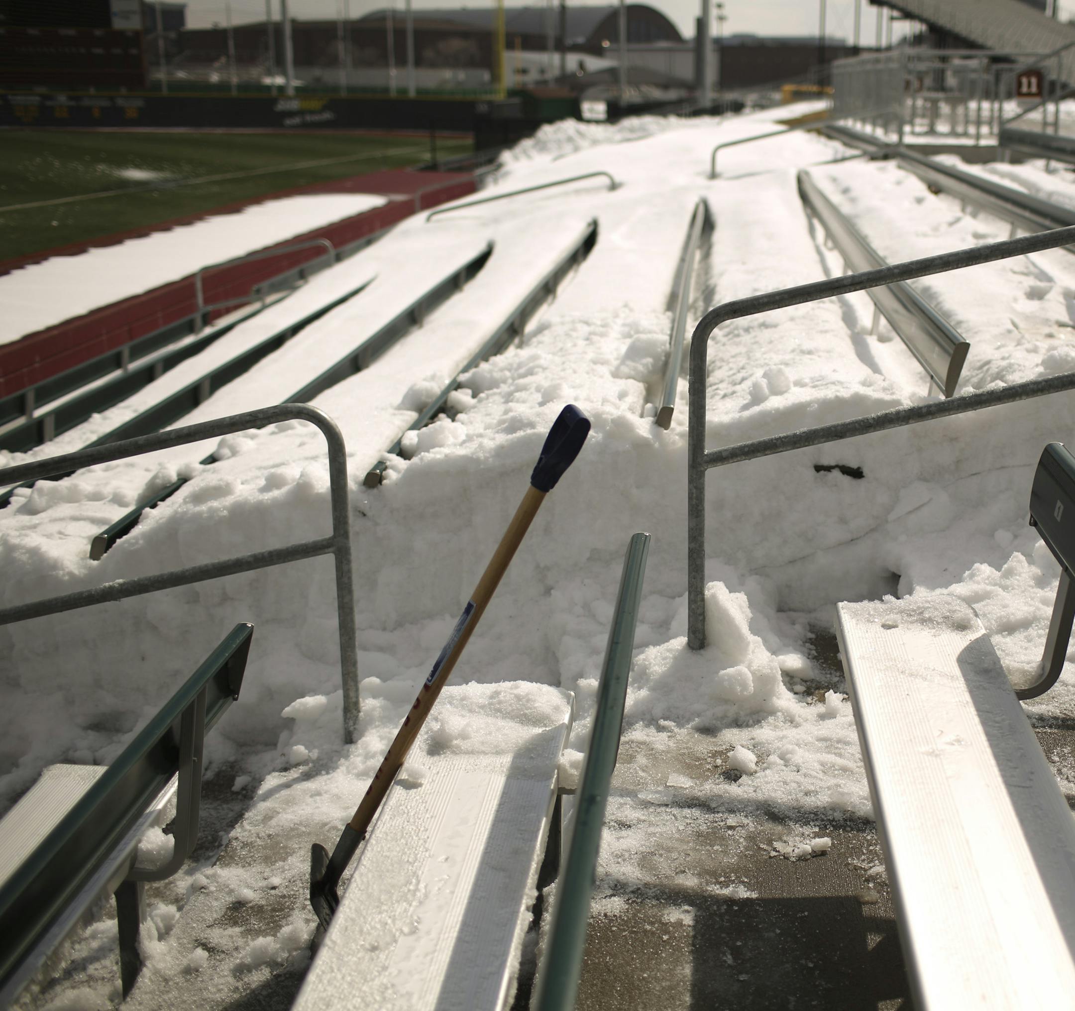 A section of the stands at Siebert Field that had yet to be cleared Monday afternoon. ] JEFF WHEELER ‚Ä¢ jeff.wheeler@startribune.com The Minnesota Gophers baseball team is preparing for their home opener this Friday. After removing snow from the field over the weekend, on Monday, March 24, 2014, a crew turned to clearing snow from the stands. Head coach John Anderson also talked about the upcoming season and the challenges of playing spring ball at a northern school.