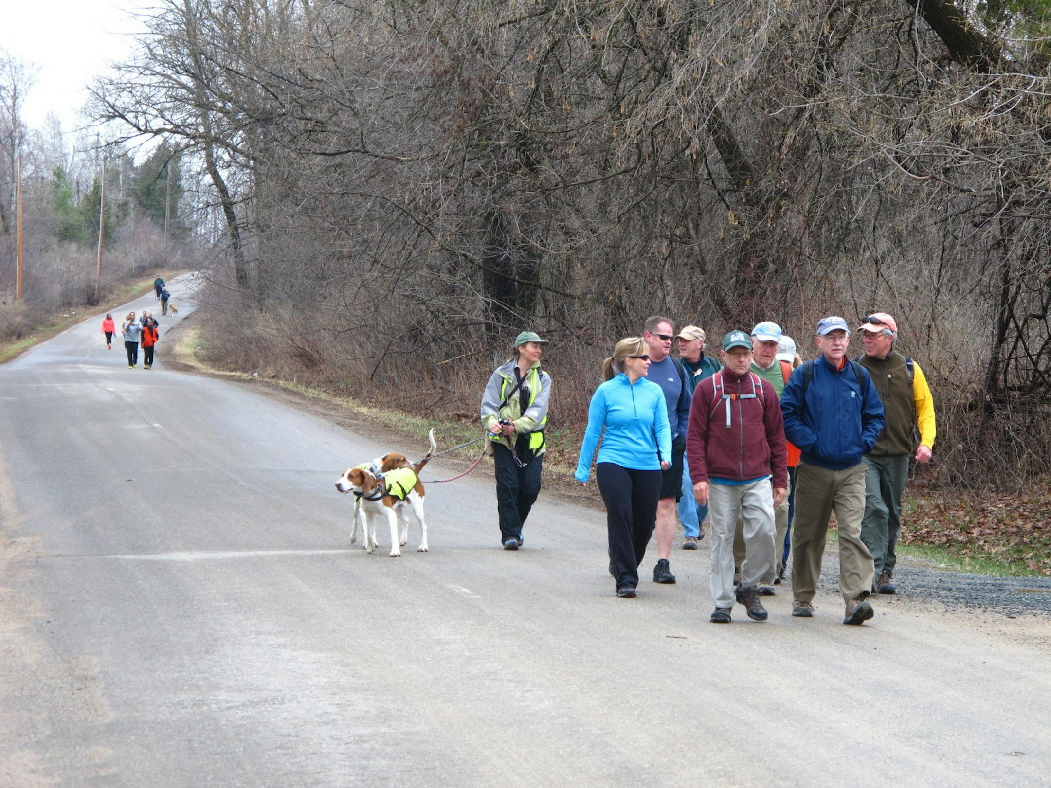 Walkers supporting Books for Africa hike down a country road near Taylors Falls., Minn., to begin a three-day journey to St. Paul. The walk will support 22,000 books for Somalia.