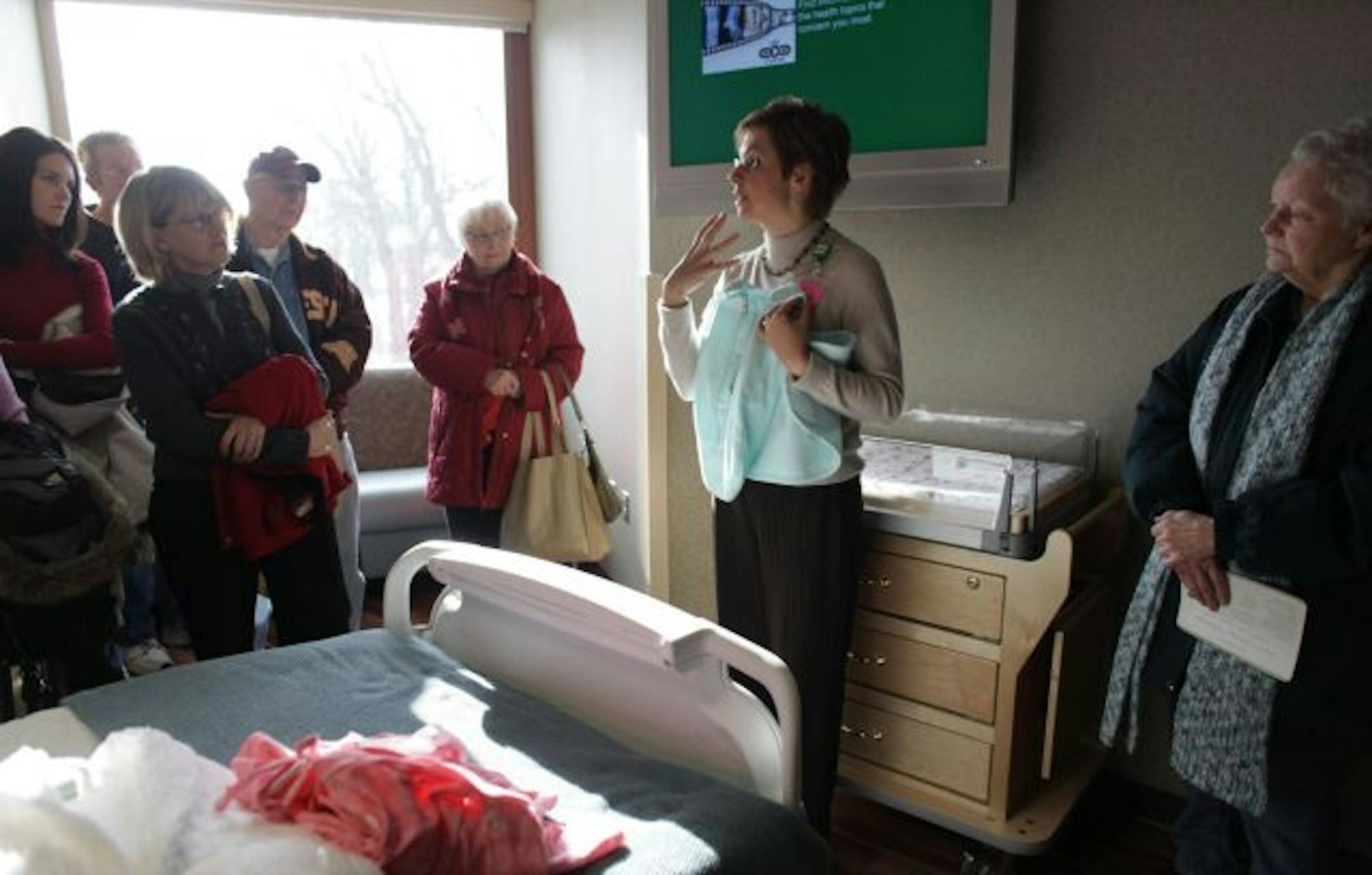 Anne-Marie Combs explained the new features of the materity rooms during the open house at Maple Grove Hospital.