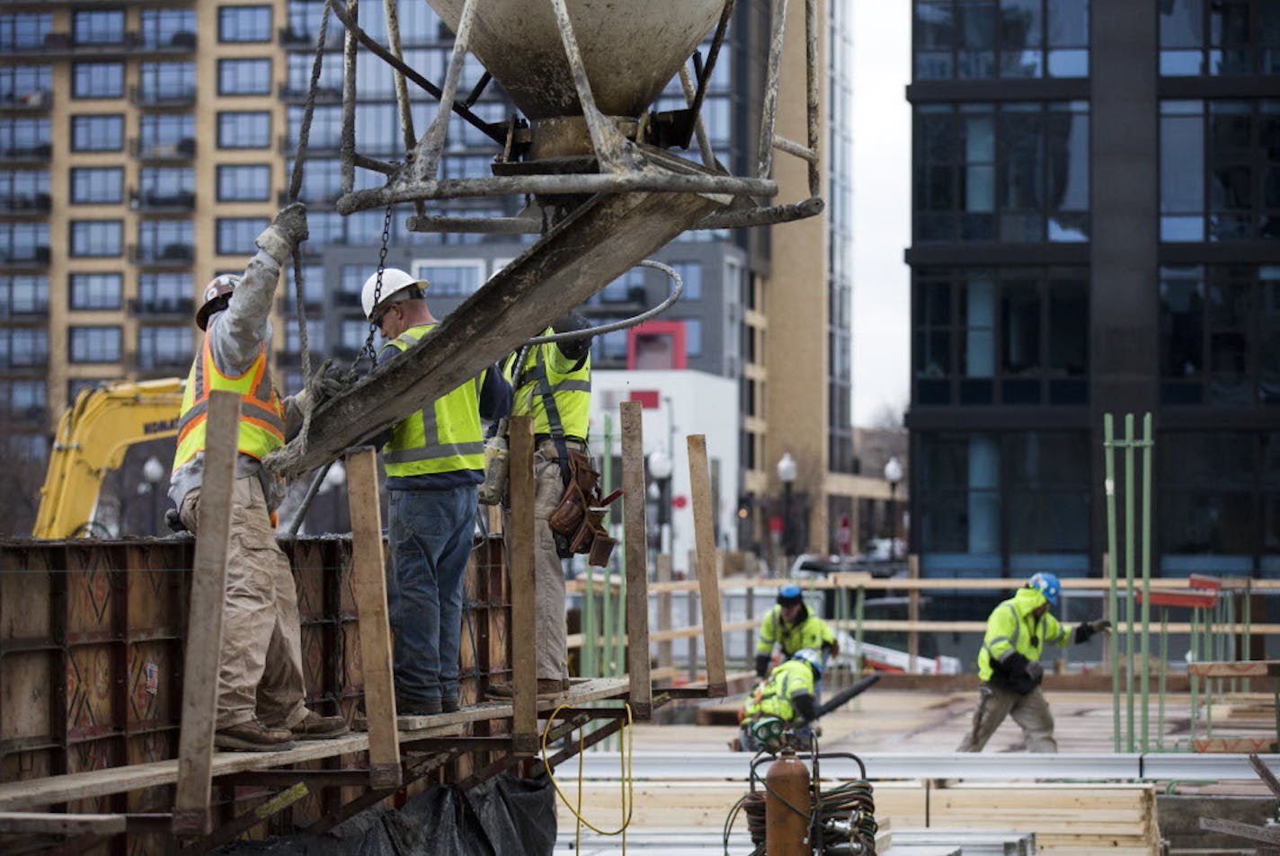 Minnesota had a strong job report for November, with construction leading the way by adding 3,300 seasonally-adjusted jobs. Here, construction is underway at the Encore Apartments in downtown Minneapolis. ] Brian.Peterson@startribune.com Minneapolis, MN - 12/17/2015