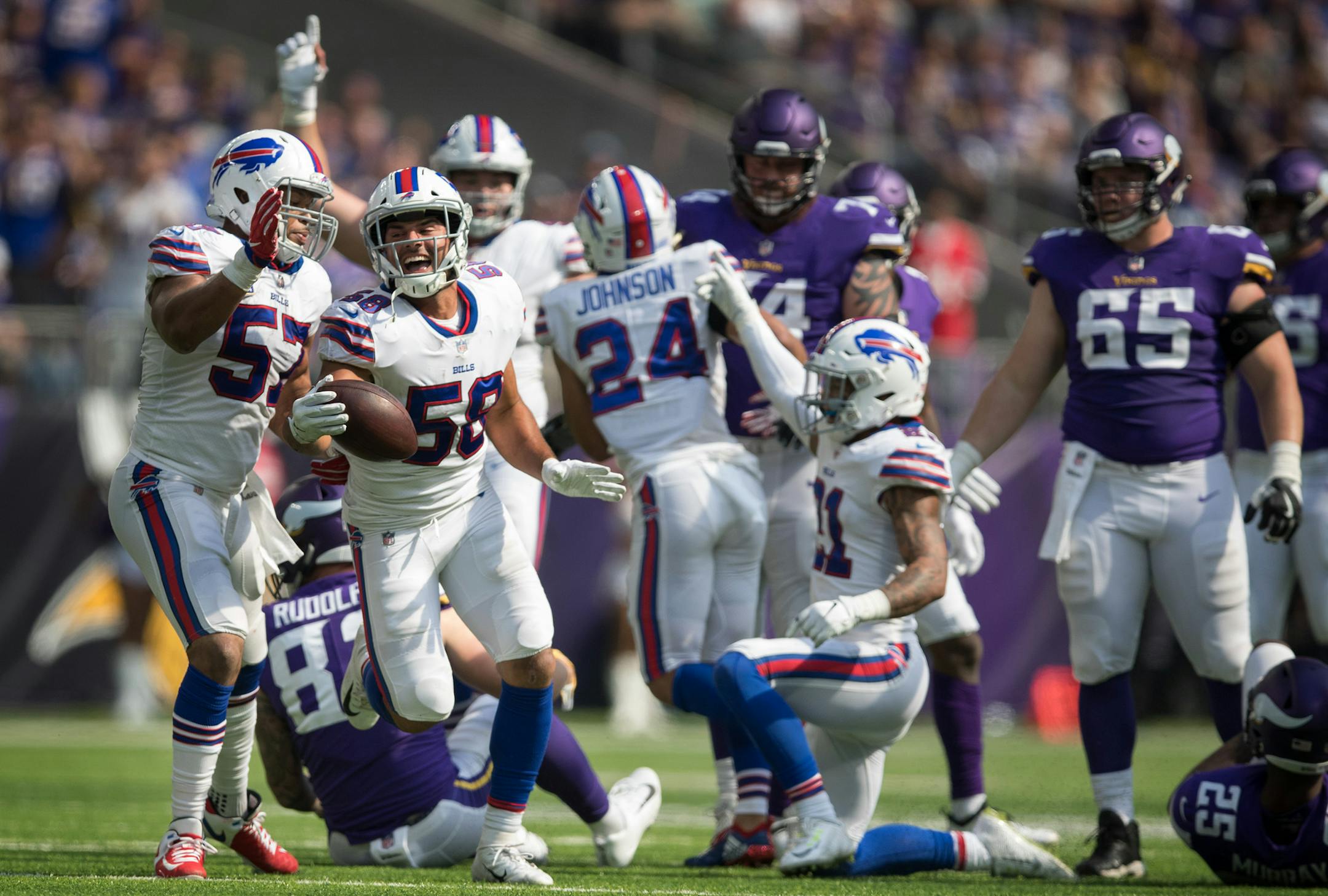 Buffalo Bills linebacker Matt Milano (58) celebrated his third quarter interception with linebacker Lorenzo Alexander (57) at US Bank Stadium Sunday September 23, 2018 in Minneapolis, MN. ] JERRY HOLT ï jerry.holt@startribune.com