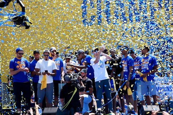 Confetti reins down on the Golden State Warriors 2017 championship team at the end of their rally Thursday, June 15, 2017 in Oakland, Calif. (Karl Mon