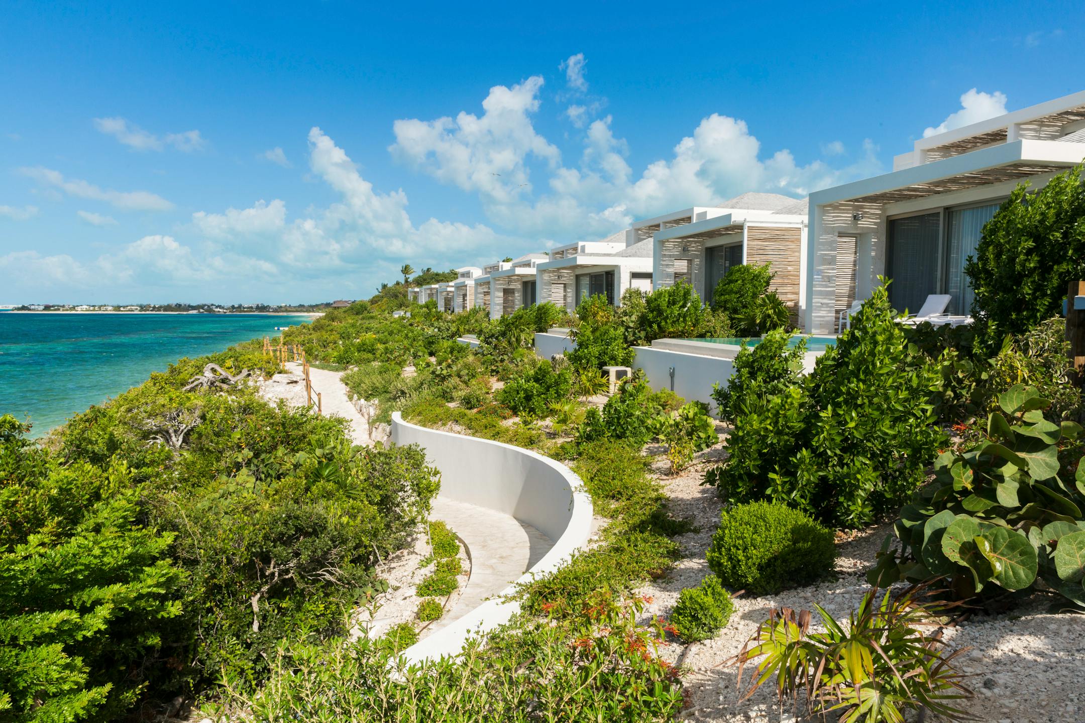 An undated photo provided by Grace Bay Resorts shows the Rock House from Grace Bay Resorts on Turks and Caicos. From an off-the-grid tropical hideaway to a reefside diving resort, these new hotels will take you far from anything that resembles snow and cold. (Grace Bay Resorts via The New York Times) — NO SALES; FOR EDITORIAL USE ONLY WITH NYT STORY SLUGGED CARIBBEAN HOTELS BY STEPHANIE ROSENBLOOM FOR NOV. 27, 2022. ALL OTHER USE PROHIBITED. —