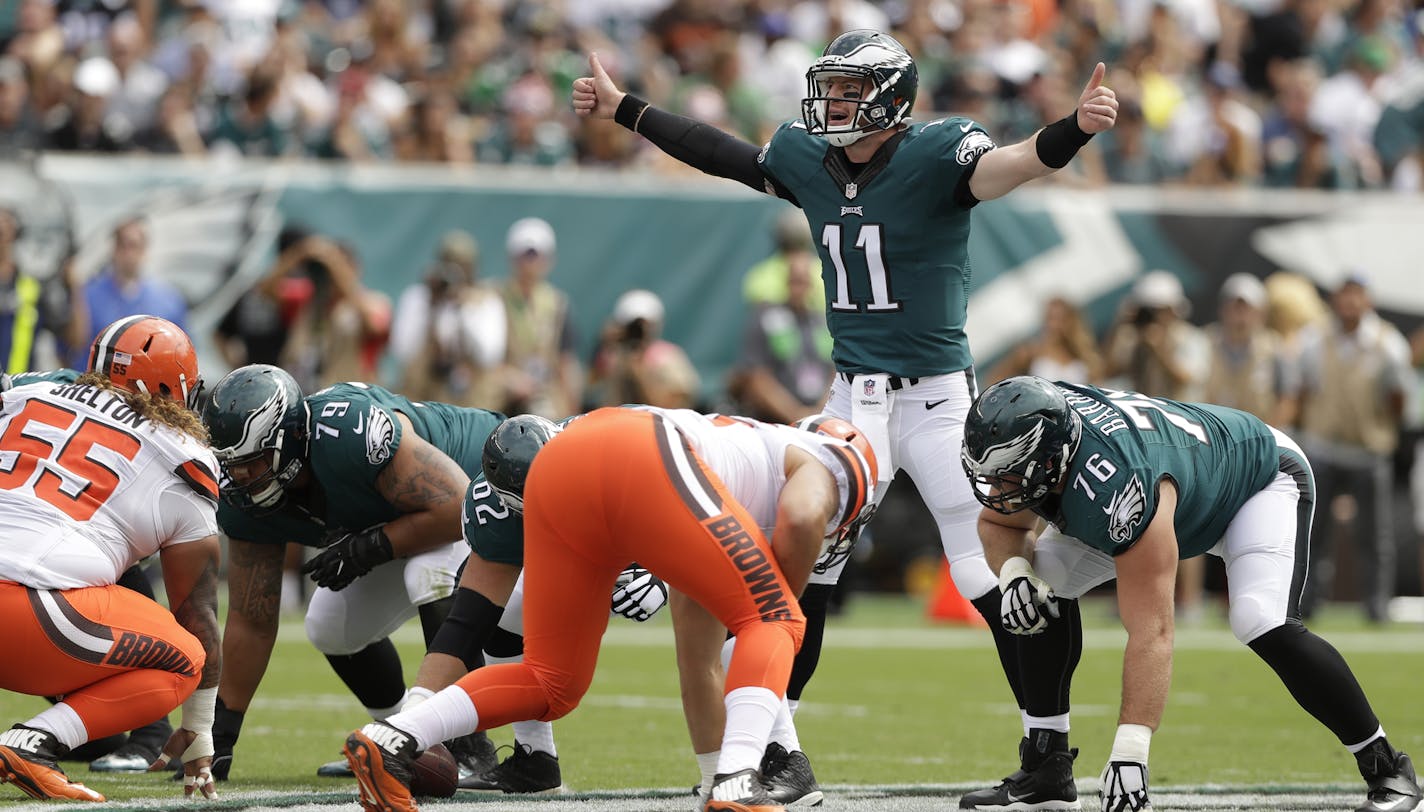 Philadelphia Eagles' Carson Wentz in action during the first half of an NFL football game against the Cleveland Browns, Sunday, Sept. 11, 2016, in Philadelphia. (AP Photo/Michael Perez) ORG XMIT: _21S6623