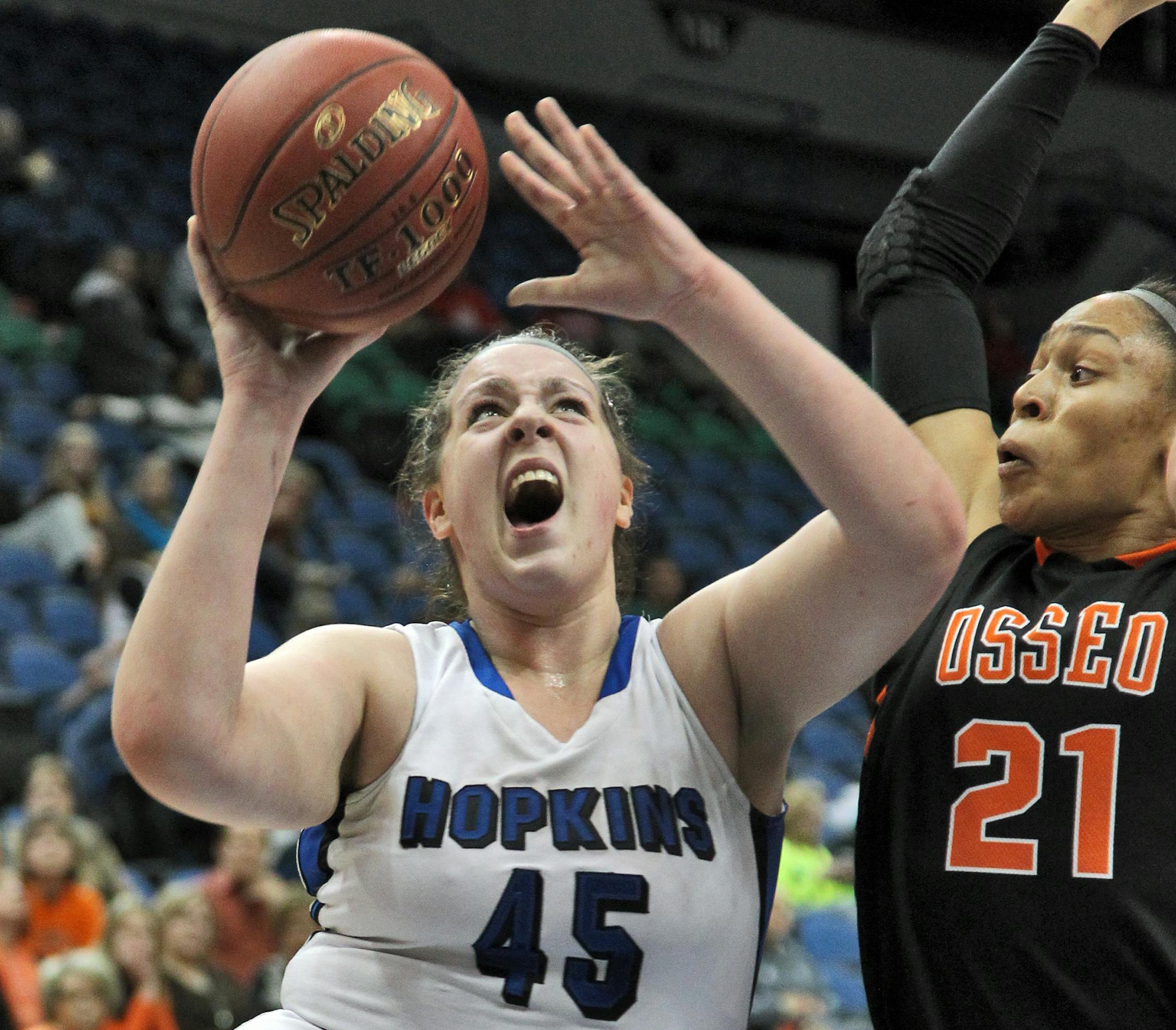 GIRLS BASKETBALL STATE SEMIFINALS Class 4A - Hopkins vs. Osseo. Hopkins Erin O'Toole (45) went up for two points against the defense of Osseo'sPhillis Webb (21). (MARLIN LEVISON/STARTRIBUNE(mlevison@startribune.com (cq -PROGRAM)