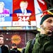 FILE-- People watch election results at Times Square in New York, Nov. 9, 2016. Clinton has followed Al Gore as the second Democratic presidential can