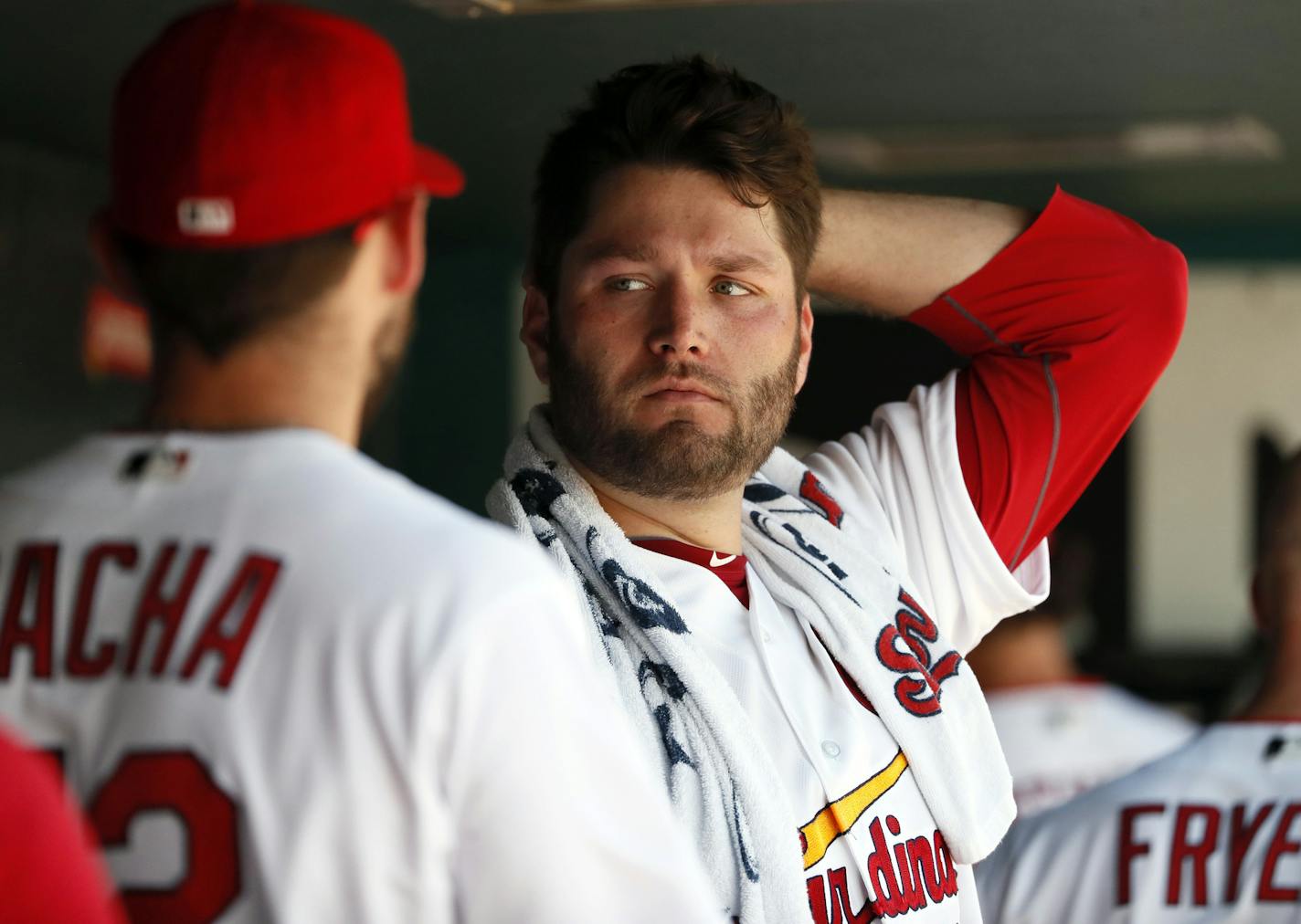 St. Louis Cardinals starting pitcher Lance Lynn, right, talks with fellow pitcher Michael Wacha after being removed during the sixth inning in the first game of a baseball doubleheader against the Milwaukee Brewers Tuesday, June 13, 2017, in St. Louis. (AP Photo/Jeff Roberson) ORG XMIT: MOJR