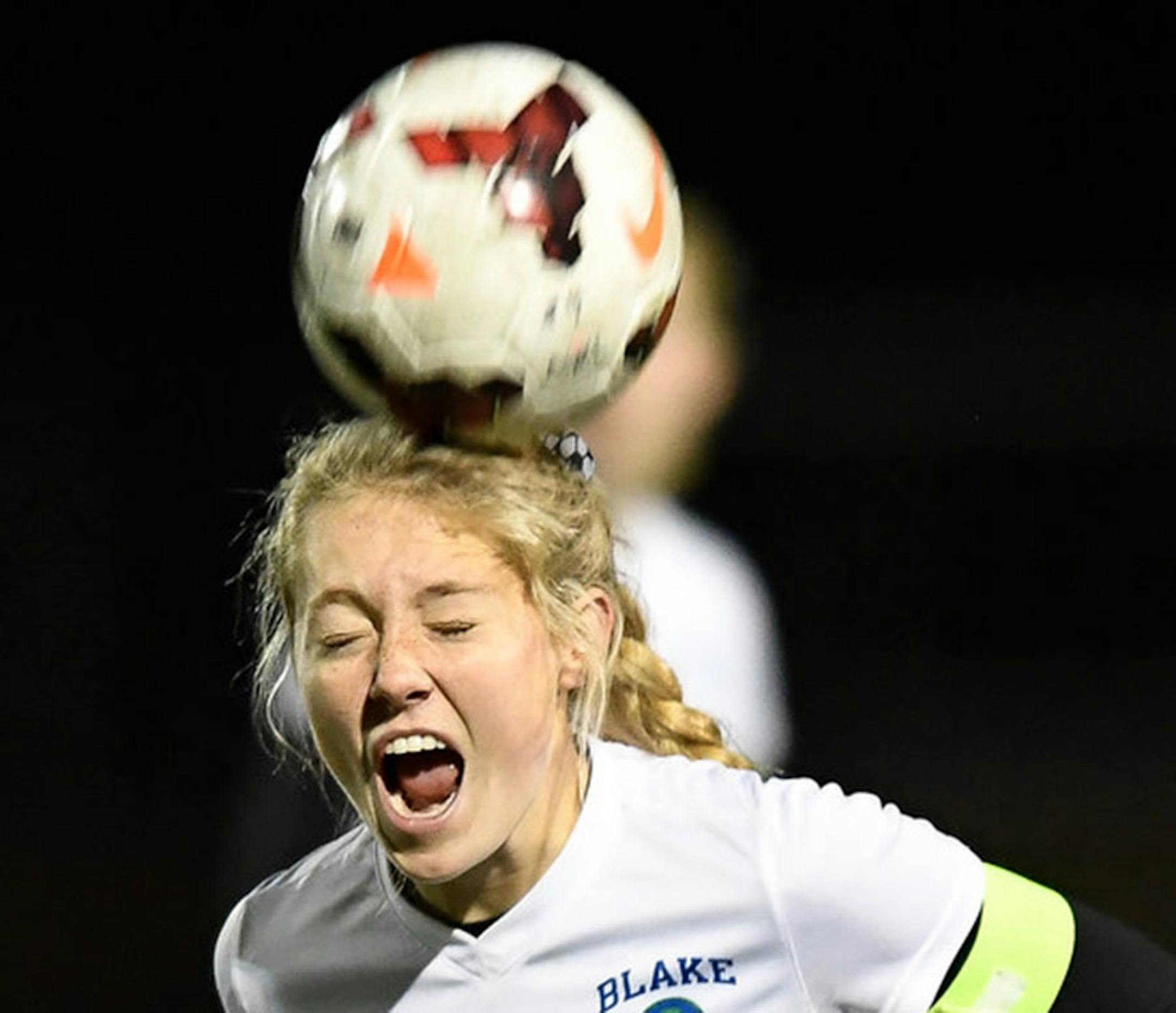 The Blake School midfielder CC Wallin (9) hit a header during the first half last month against Visitation during their 1A quarterfinal game.