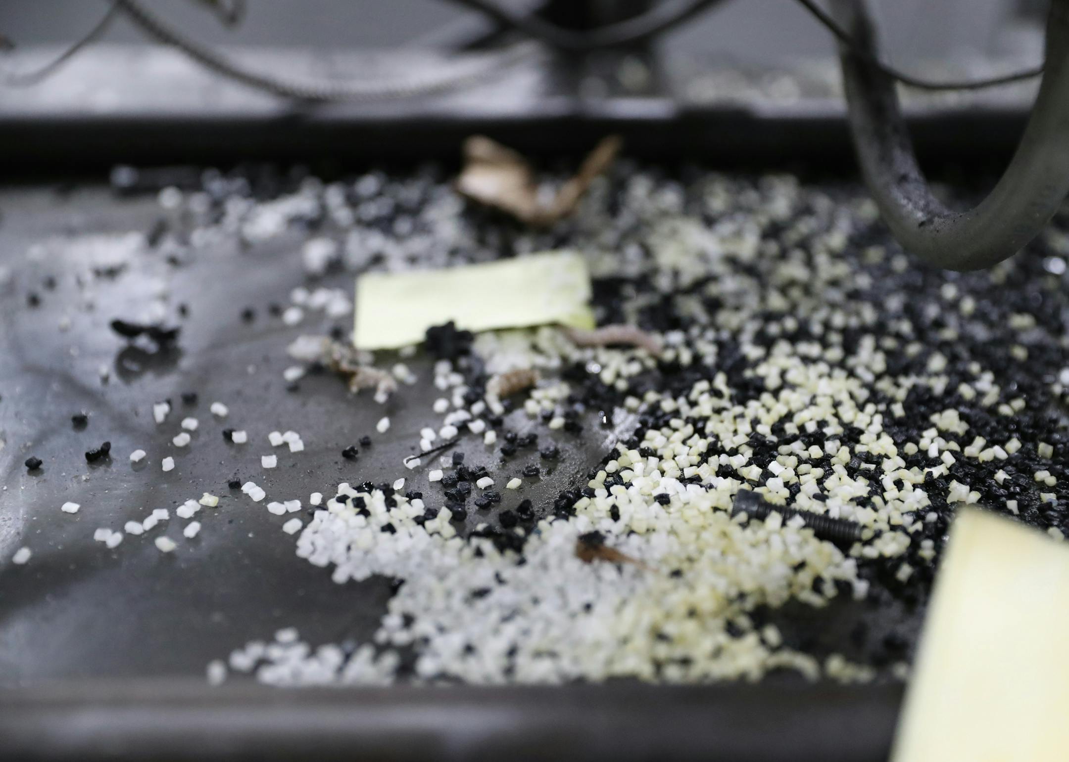 Pellets used to produce plastic parts were seen at a work station inside the Protolabs Rosemount location on Thursday, April 4, 2019. ] Shari L. Gross &#xa5; shari.gross@startribune.com Protolabs injection molding trainer Truly Paw will be teaching other workers how to work the large molding machines. **ED NOTE** Truly wasn't conducting any training while I was there. She was trimming away excess plastic from edges of pieces that had been pressed.