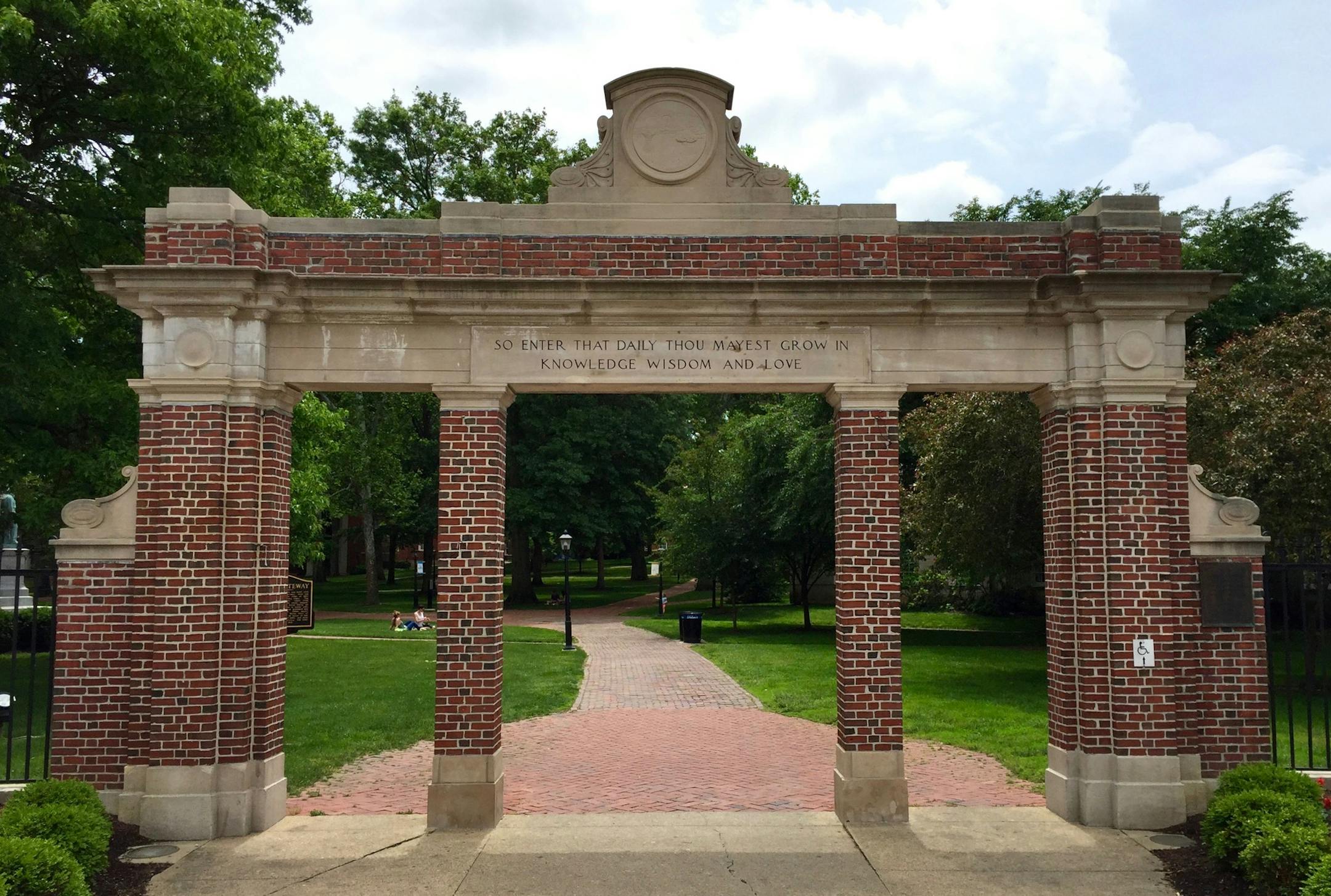 Red-brick architecture pervades Athens, Ohio, such as the Alumni Gates leading into the College Green of Ohio University.