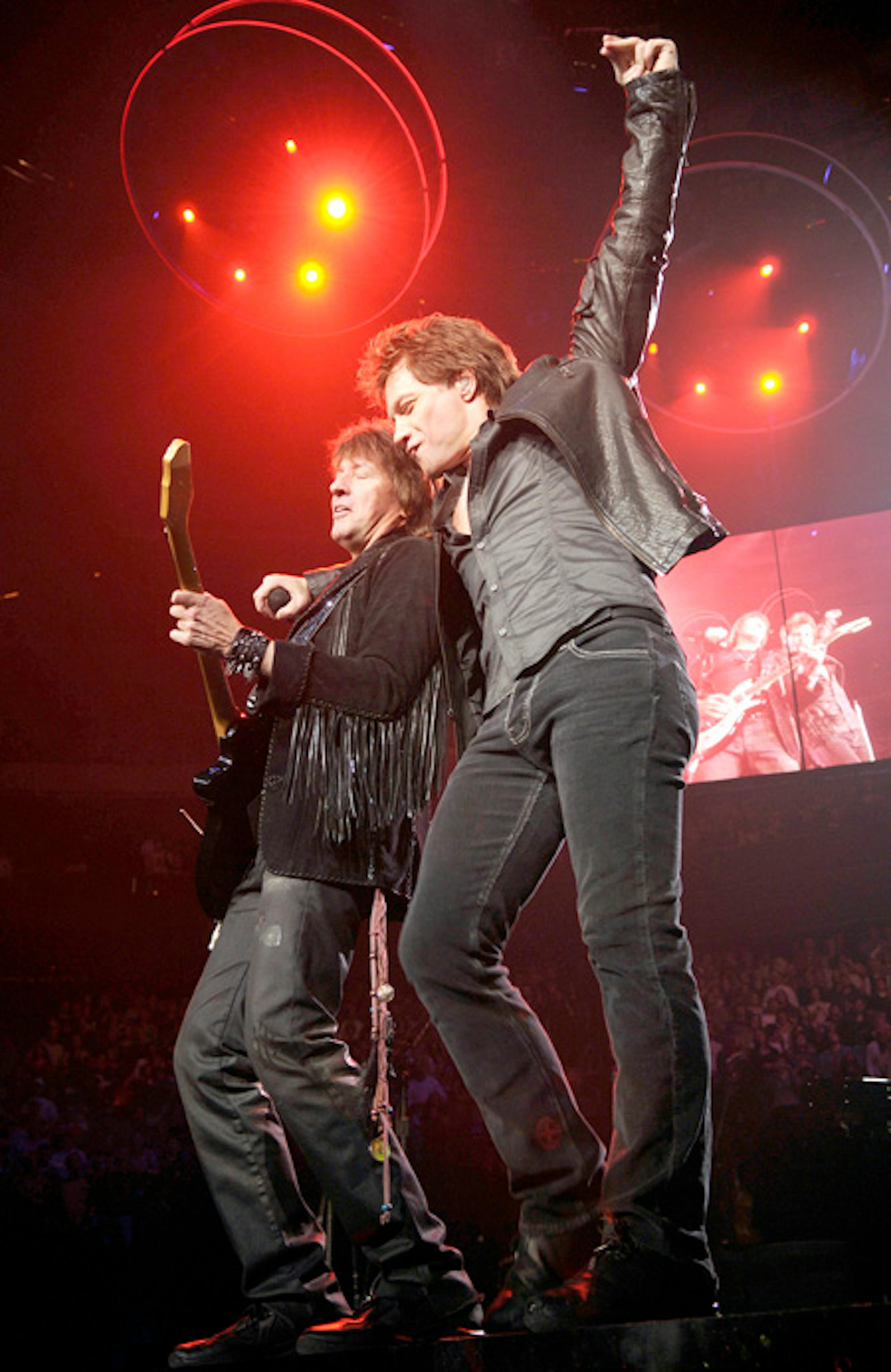 Bon Jovi's material from his new "Lost Highway" CD sounded more country than rock 'n' roll, but that didn't matter to his fans at St. Paul's Xcel Energy Center on Tuesday.