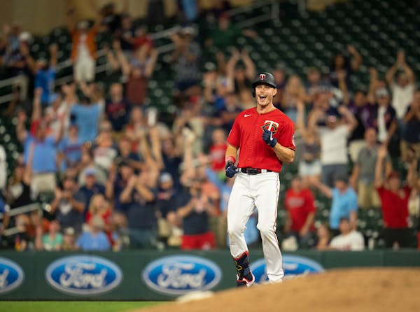 Minnesota Twins right fielder Max Kepler reacted after he hit an RBI single in the 10th inning that scored Kenta Maeda to win the game. ] JEFF WHEELER