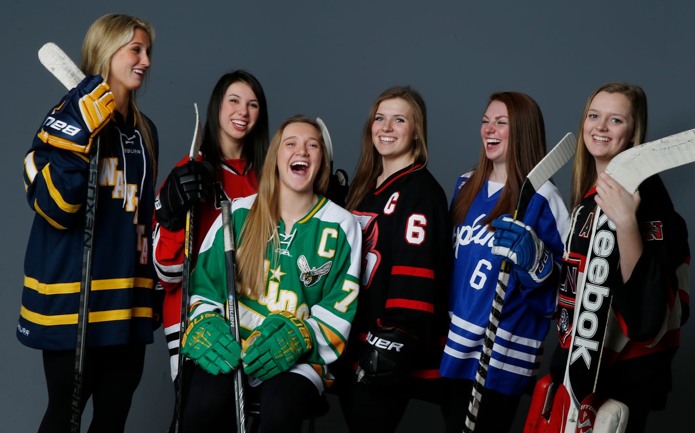 Player of the Year Taylor Williamson (No. 7 in green) of Edina held court with the rest of the Star Tribune Girls' Hockey All-Metro first team. They are, from left, Sophia Shaver of Wayzata, Charly Dahlquist of Eden Prairie, Lauren Boyle of Eden Prairie, Grace Bizal of Hopkins and Abby Cooper of Lakeville North.