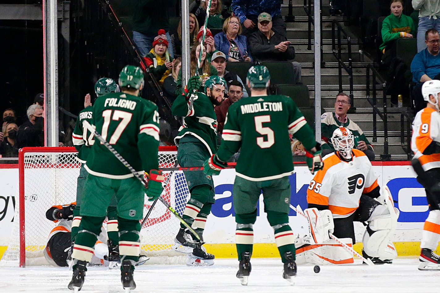 Wild left wing Jordan Greenway celebrates his goal with teammates Marcus Foligno (17), Jacob Middleton (5) and Joel Eriksson Ek (14) in the second period Tuesday.