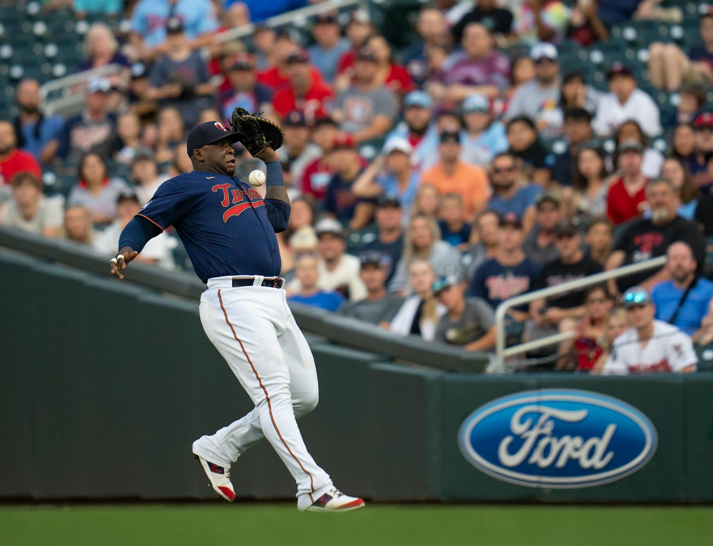 Minnesota Twins first baseman Miguel Sano (22) earned an error when he dropped a pop fly hit by Chicago White Sox center fielder Luis Robert (88) in the first inning. ] JEFF WHEELER • jeff.wheeler@startribune.com