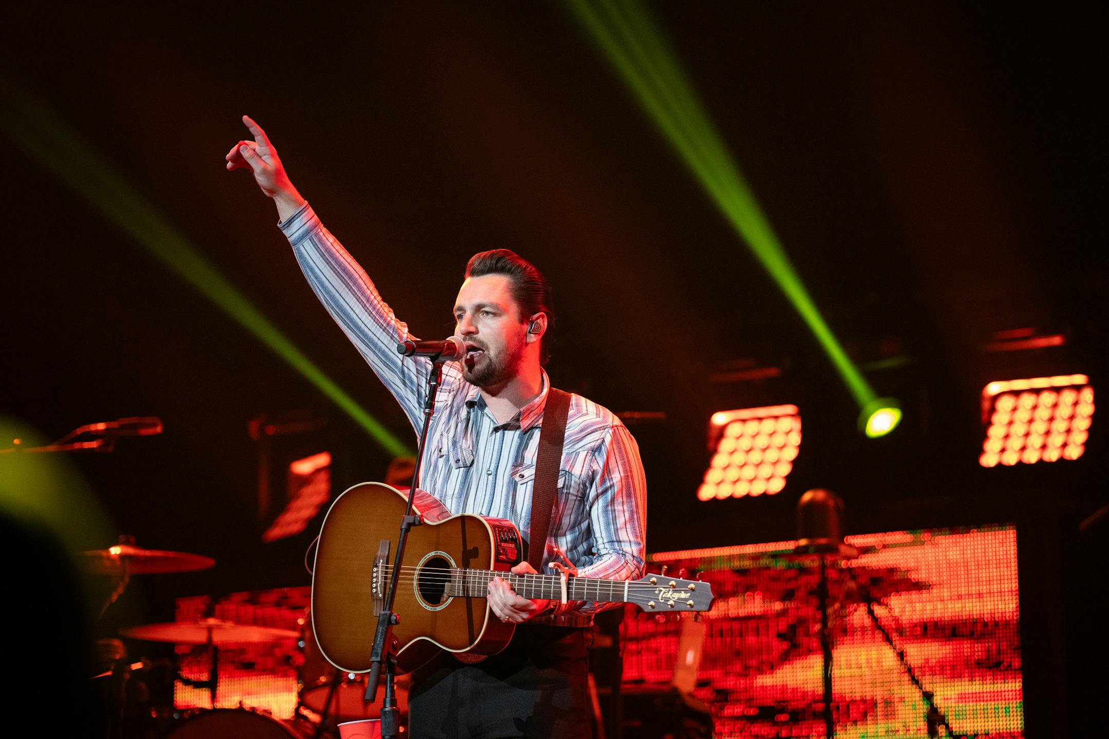 Chayce Beckham performs as one of three opening acts for Luke Bryan at the Xcel Energy Center in St. Paul, Minn., on Saturday, Oct. 14, 2023.