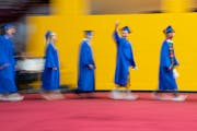 Seniors process to their seats during the Hopkins High School graduation ceremony Tuesday, June 6, 2023, at Maturi Pavilion on the University of Minne