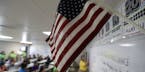 A teacher uses the Pledge of Allegiance in a reading class the U.S. government's newest holding center for migrant children in Carrizo Springs, Texas,