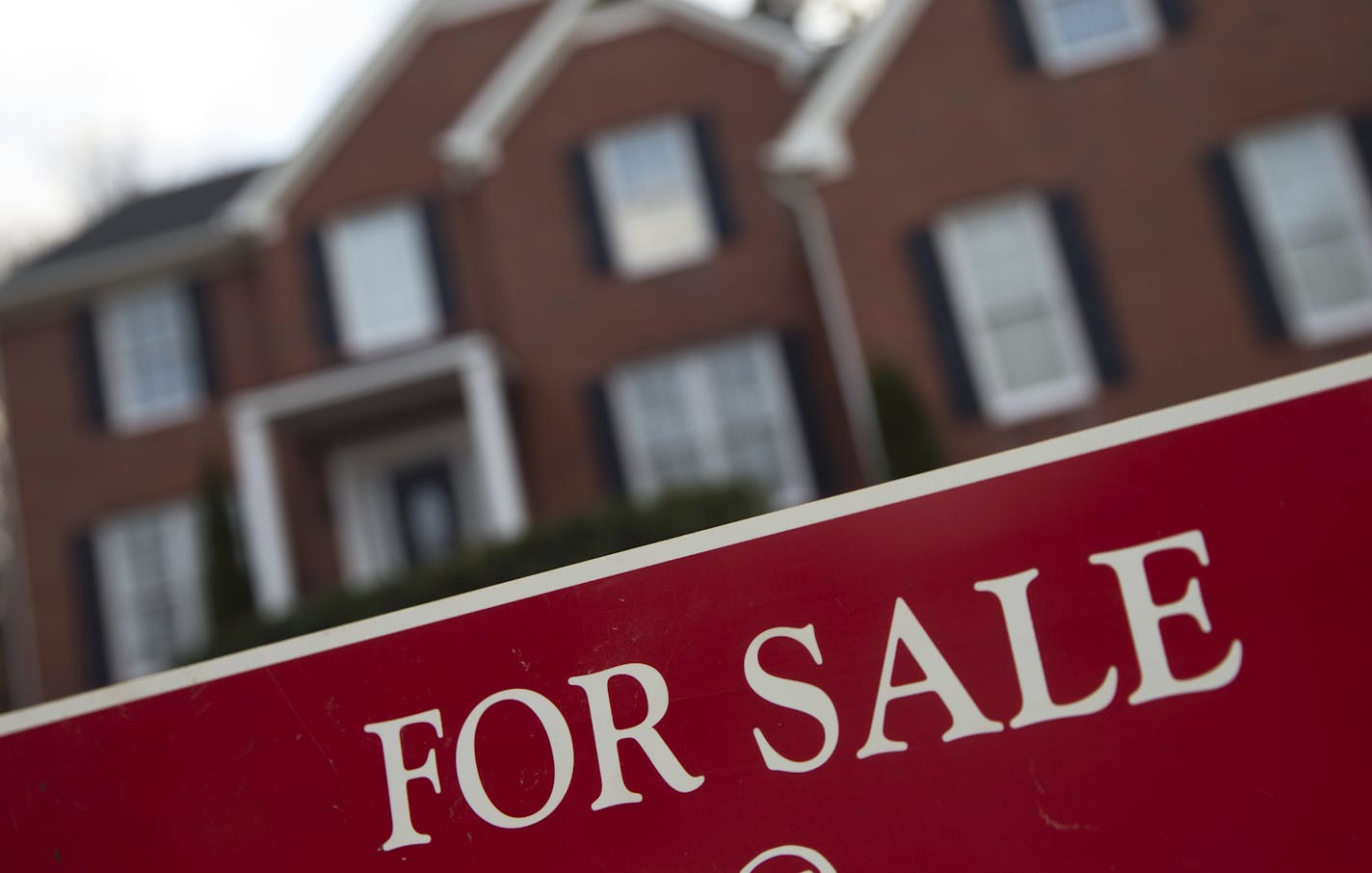 FILE - This Thursday, Dec. 3, 2015, file photo shows an existing home for sale in Roswell, Ga. After nine straight weeks of increases, long-term US mortgage rates fell the week of Jan. 5, 2017. (AP Photo/John Bazemore, File)