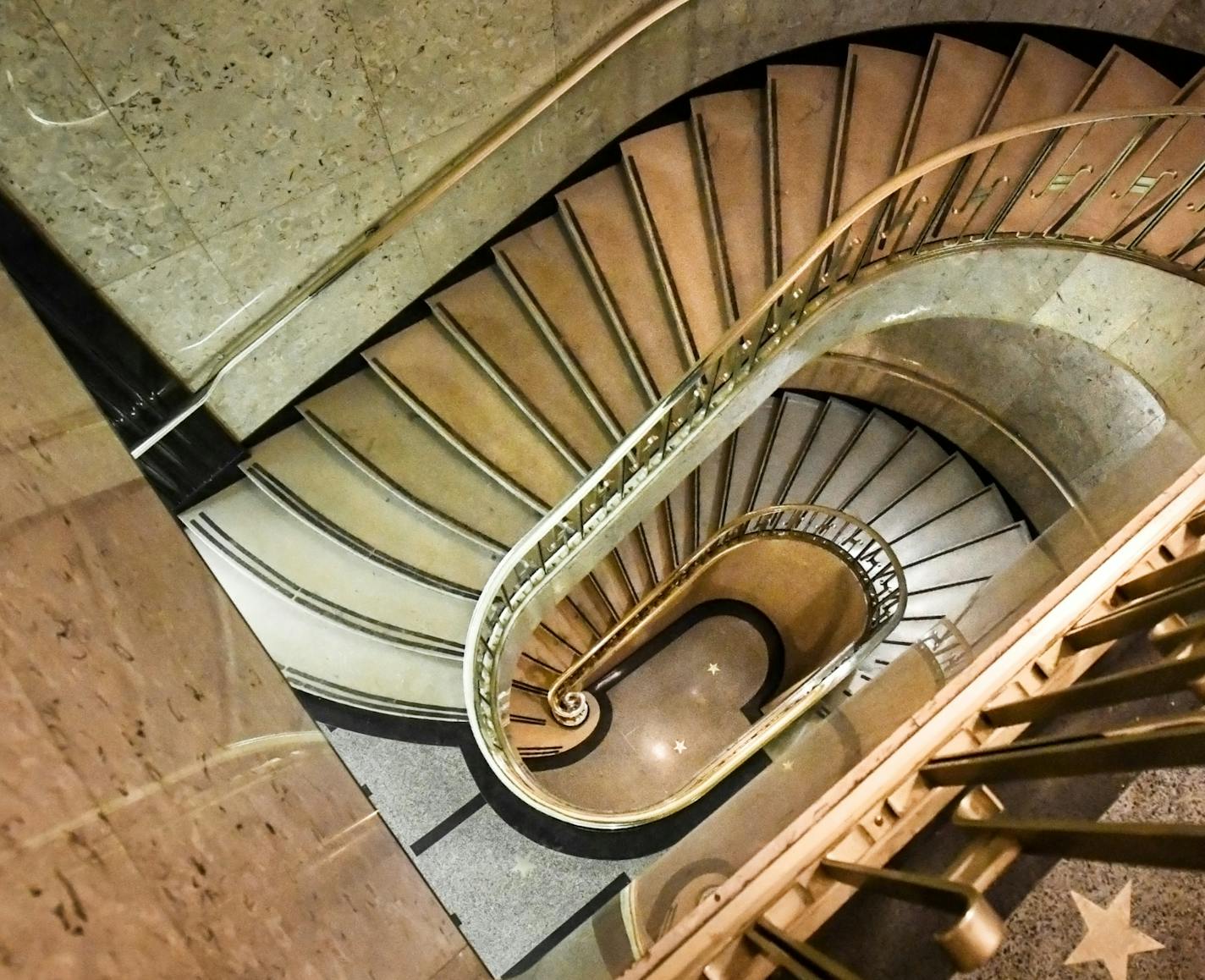 The lobby staircase of the Rand Tower in downtown Minneapolis. ] GLEN STUBBE &#x2022; glen.stubbe@startribune.com Thursday, February 22, 2018 The 26-story Rand Tower in downtown Minneapolis was completed in 1929. Much of the building is covered in Art Deco ornamentation with an aviation theme. The sculpture in the lobby is Wings by Oskar J. W. Hansen.