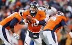 Denver Broncos quarterback Peyton Manning (18)
