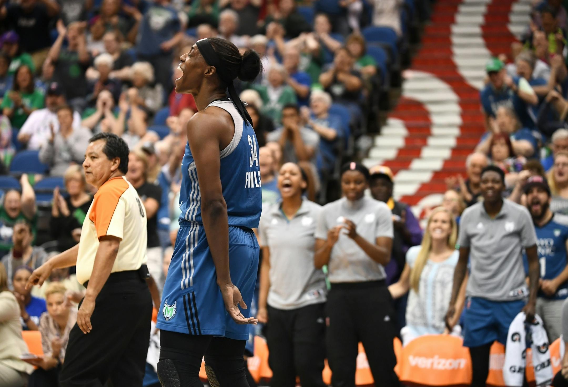 Minnesota Lynx center Sylvia Fowles (34) reacted after scoring a layup and drawing a foul by Phoenix Mercury forward Penny Taylor (13) in the second quarter.