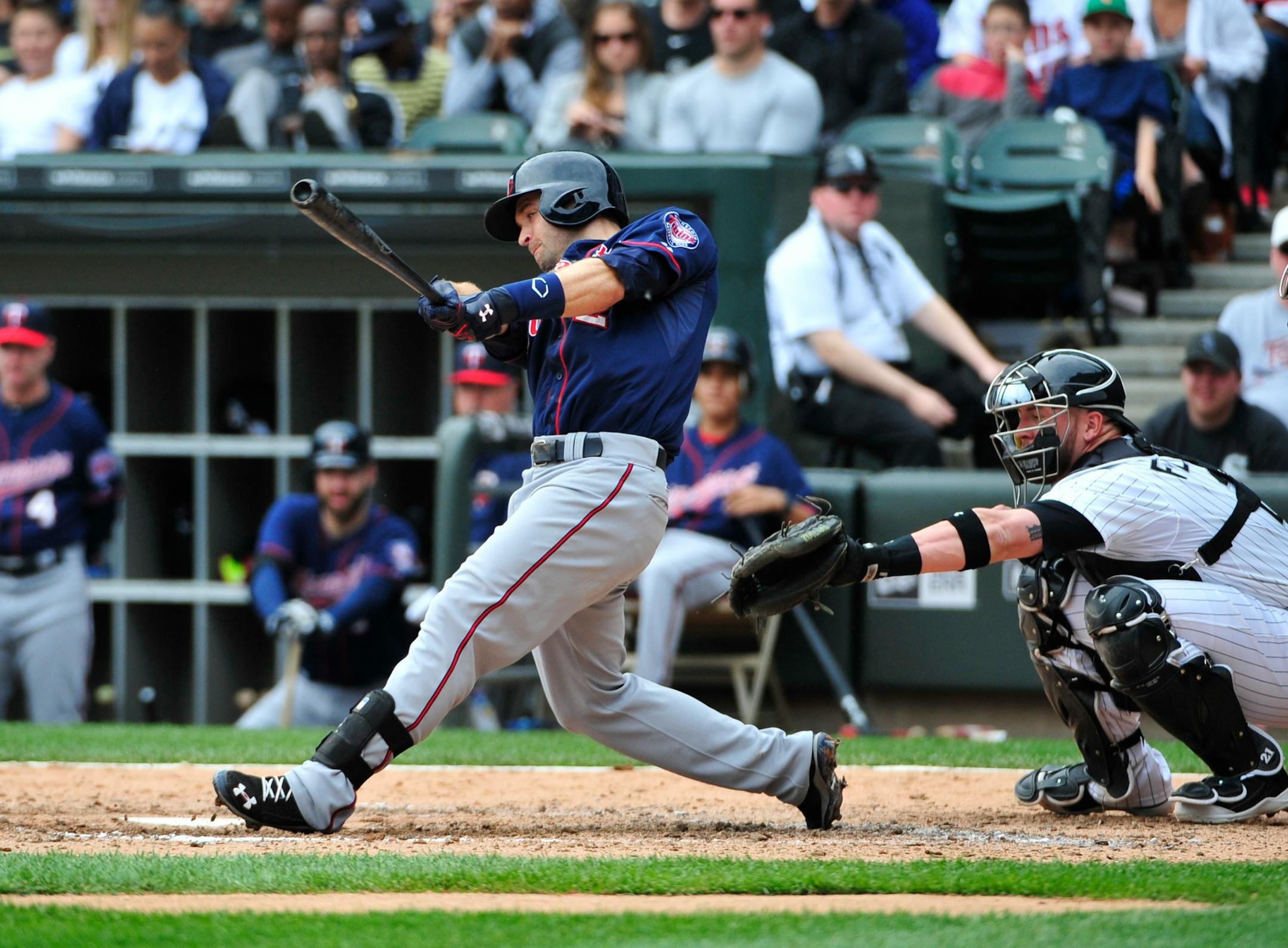 The Twins' Brian Dozier hit a three-run homer, his second of the game after a solo shot to lead off the game, against the Chicago White Sox during the seventh inning Sunday.