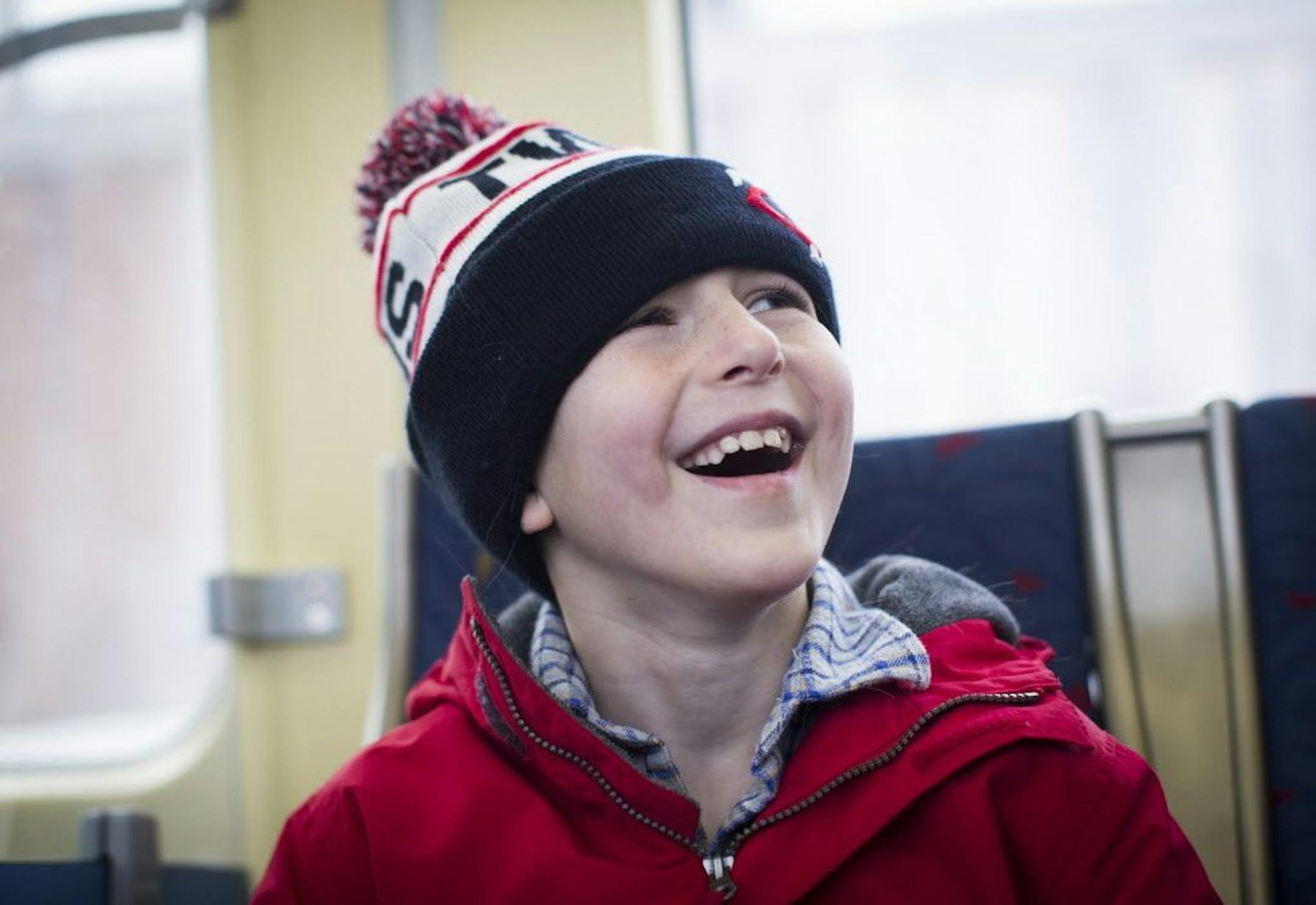 Karlis Barobs is a "trainiac." He rides the train every chance he gets, and is a devoted fan of the Choo Choo Bob train store and TV show. He is pictured while riding the light rail on Monday, February 8, 2016 in Minneapolis.